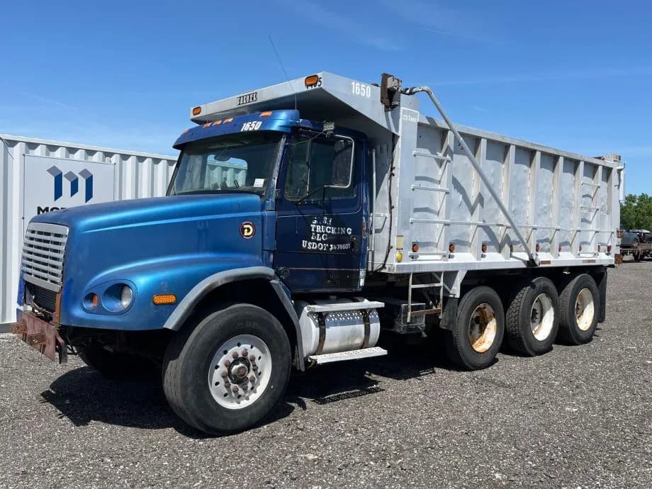 1999 Freightliner FL112 Tri-Axle 18’ - Dump